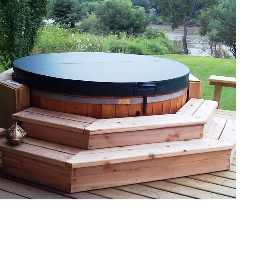 Hot Tub with Cover This image depicts a brown hot tub on an outdoor deck with its cover on.