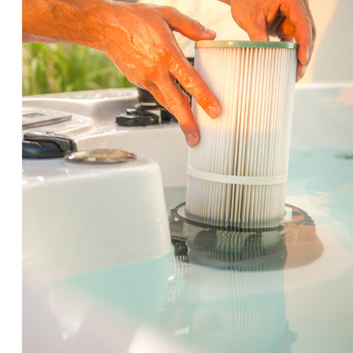 Hot Tub Filter A man's hands replacing a hot tub's filter