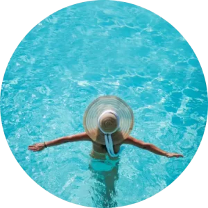 Crystal Clear Water Circle Person in sun hat swimming in pool with crystal clear water