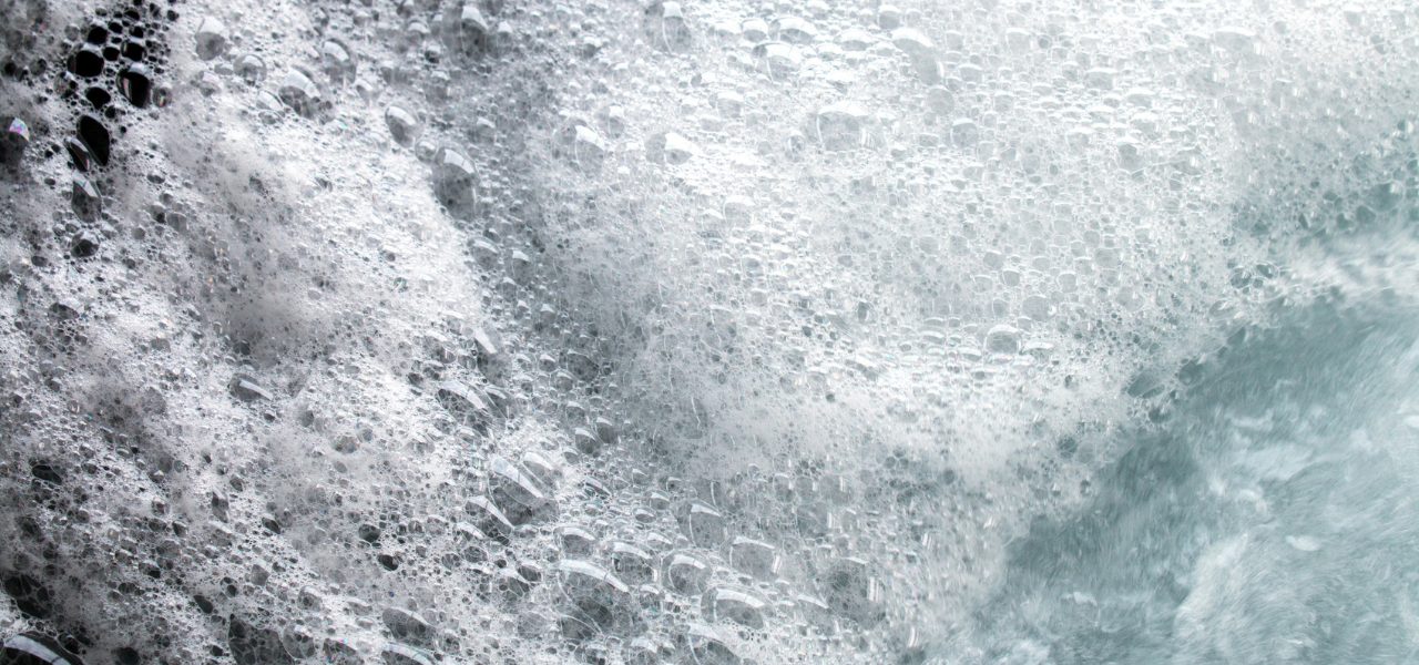 Foamy Water Close up image of very foamy hot tub water.