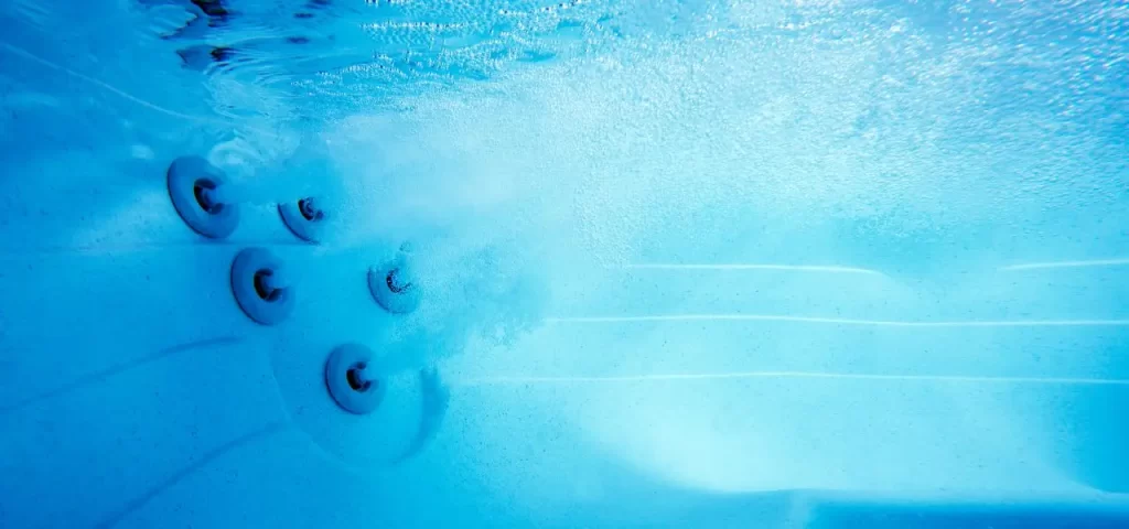Underwater shot of a cloudy hot tub.