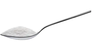 A silver tablespoon of chlorinating granules