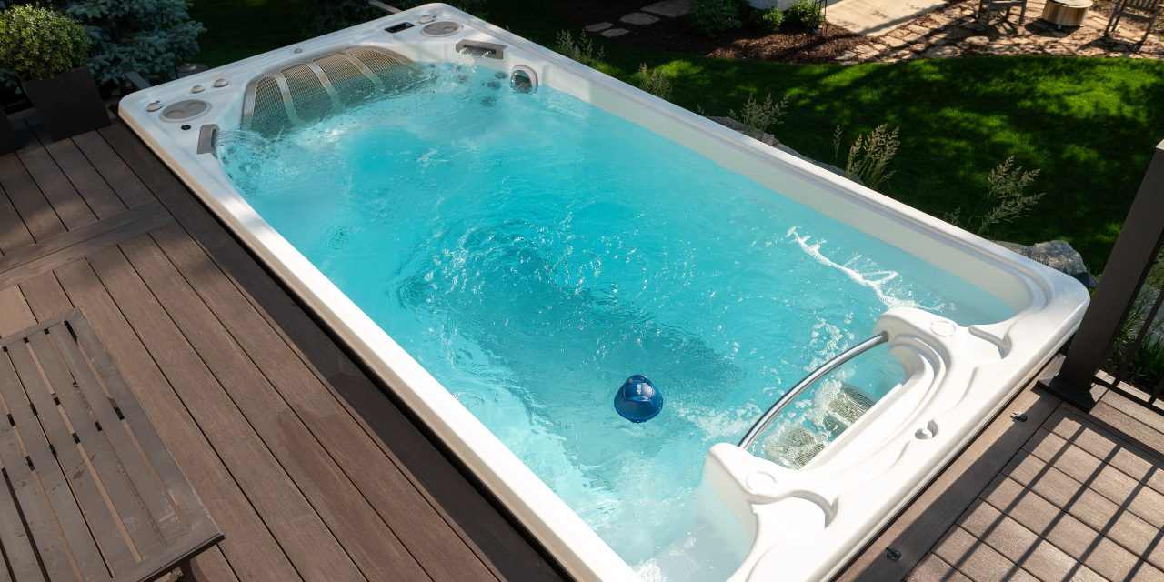 A Swim Spa with FROG @ease an overhead shot of a sparkling swim spa with a FROG @ease for Swim Spas floating in the water