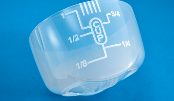 TruDose™ cap for precise measuring of FROG® DropH® in hot tubs and spas.